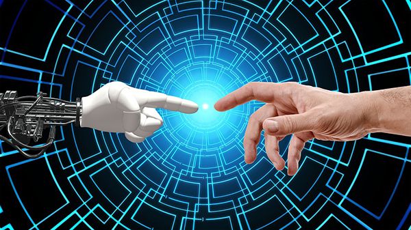 Human finger reaching for robot finger