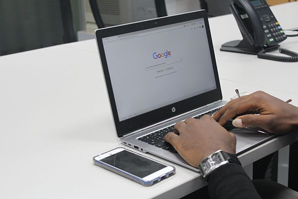Person searching on Google for what is a