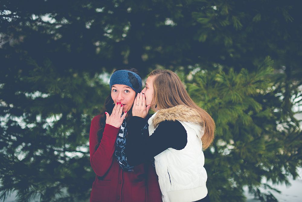 Two girls gossiping about Google+