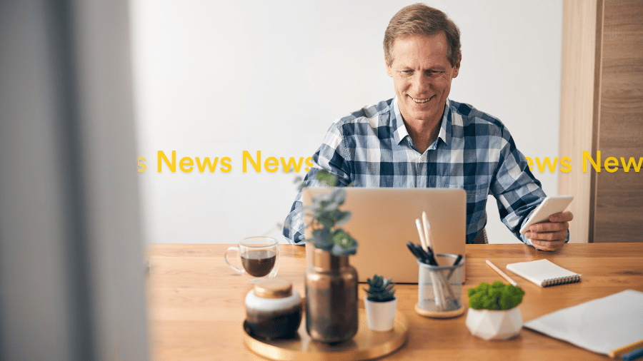 Business owner searching the latest business news tech news and marketing news on Google Search. working from home business owner | Localsearch QLD