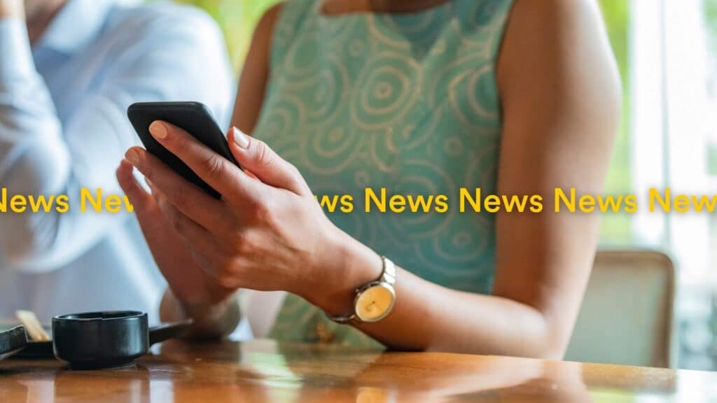 Business women checking email for News Highlights blog Localsearch QLD